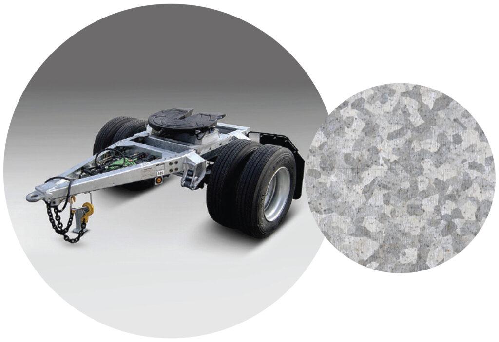Dolly_Galvanized A Hyundai Translead Wide Single Dolly, presented with a close-up insert showcasing its hot-dipped galvanization, highlighting Hyundai's innovation in trailer technology for superior corrosion resistance.