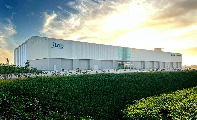 The exterior of Hyundai Translead's Innovation Lab (iLab) building, featuring modern architecture and landscaping, representing a dedicated facility for empowering greater innovation and quality in trailer technology to meet customer needs.